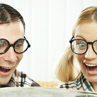 couple reading exciting headline